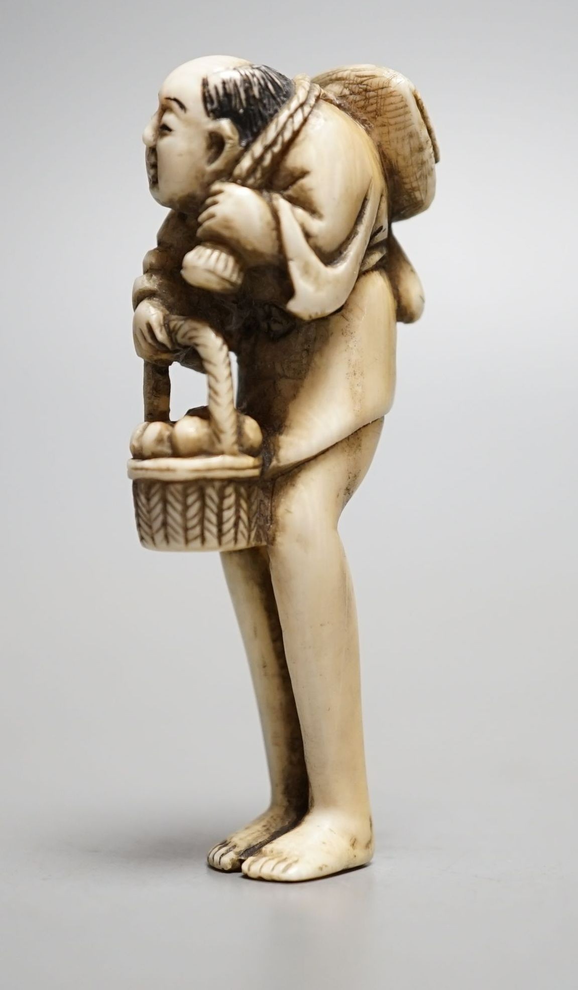 A Japanese ivory netsuke of Tenaga, 19th century, 7 cms high